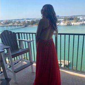 $150 red backless prom dress. great quality comfortable and breathable